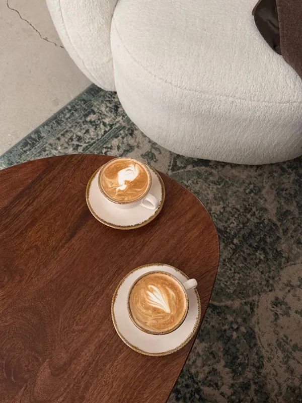 Cafe latte art on a wooden table